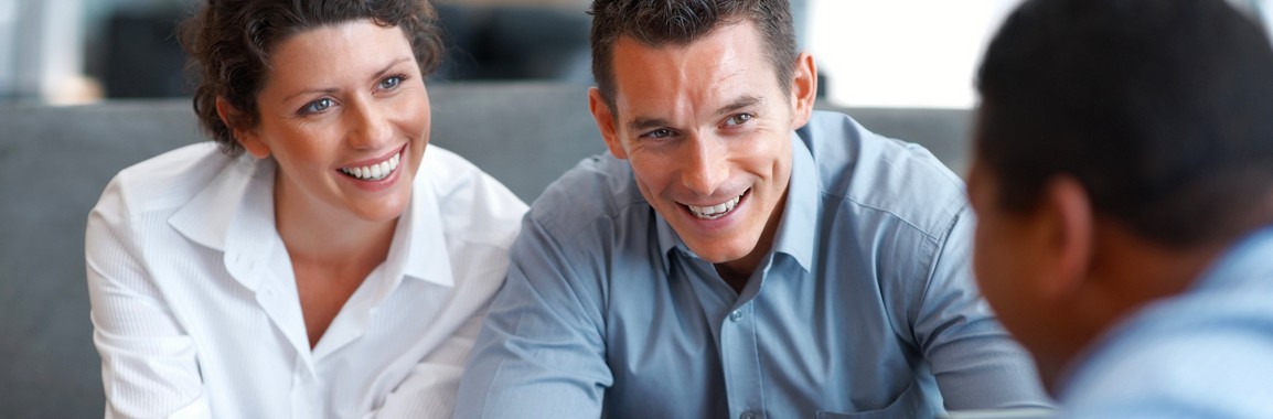 Couple visiting a financial planner.